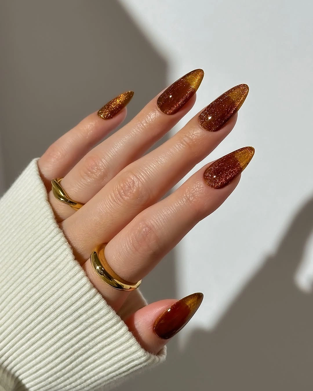 september nail art ideas 2026 Golden Cinnamon Cat Eye Glow