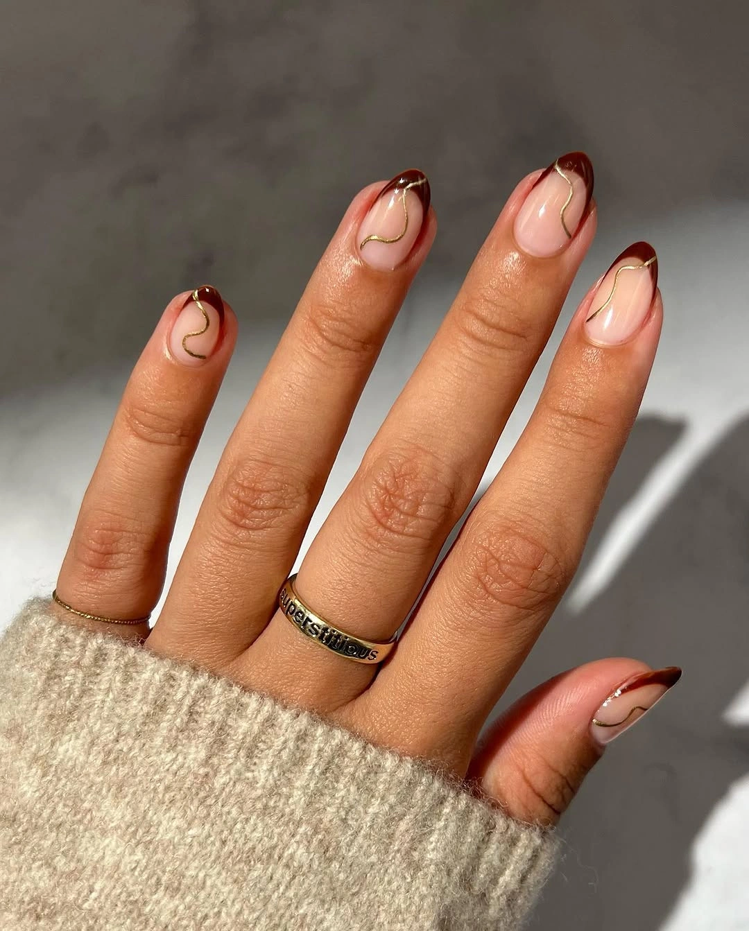 september nail art ideas 2026 Chocolate French With Golden Waves