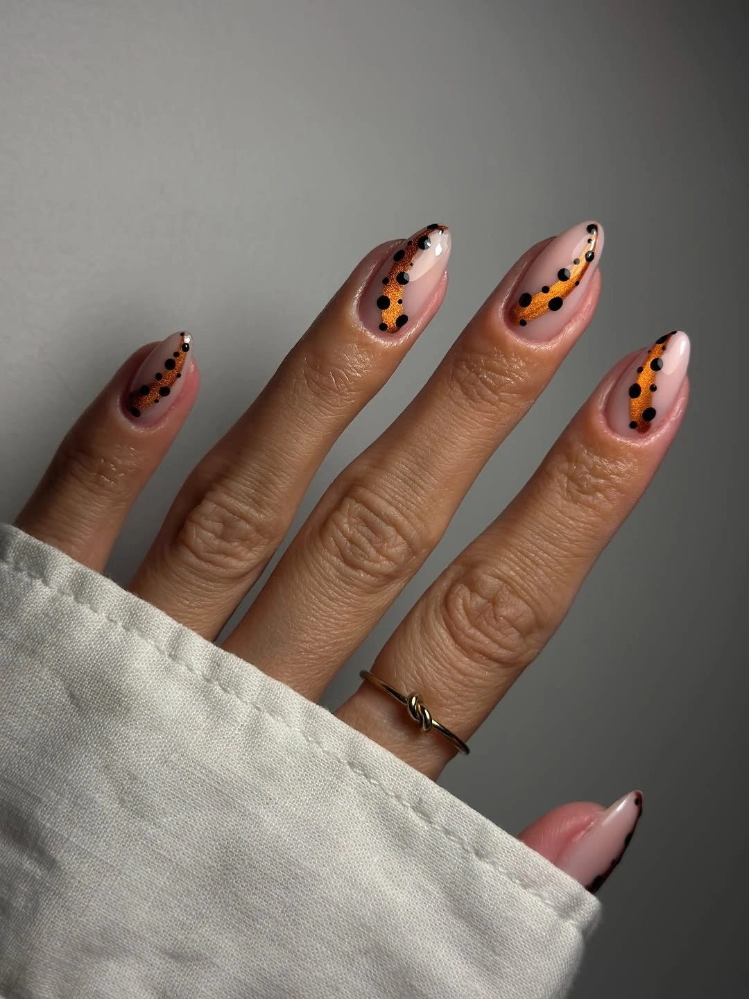 september nails color 2026 Minimal Copper Waves With Graphic Black Dots