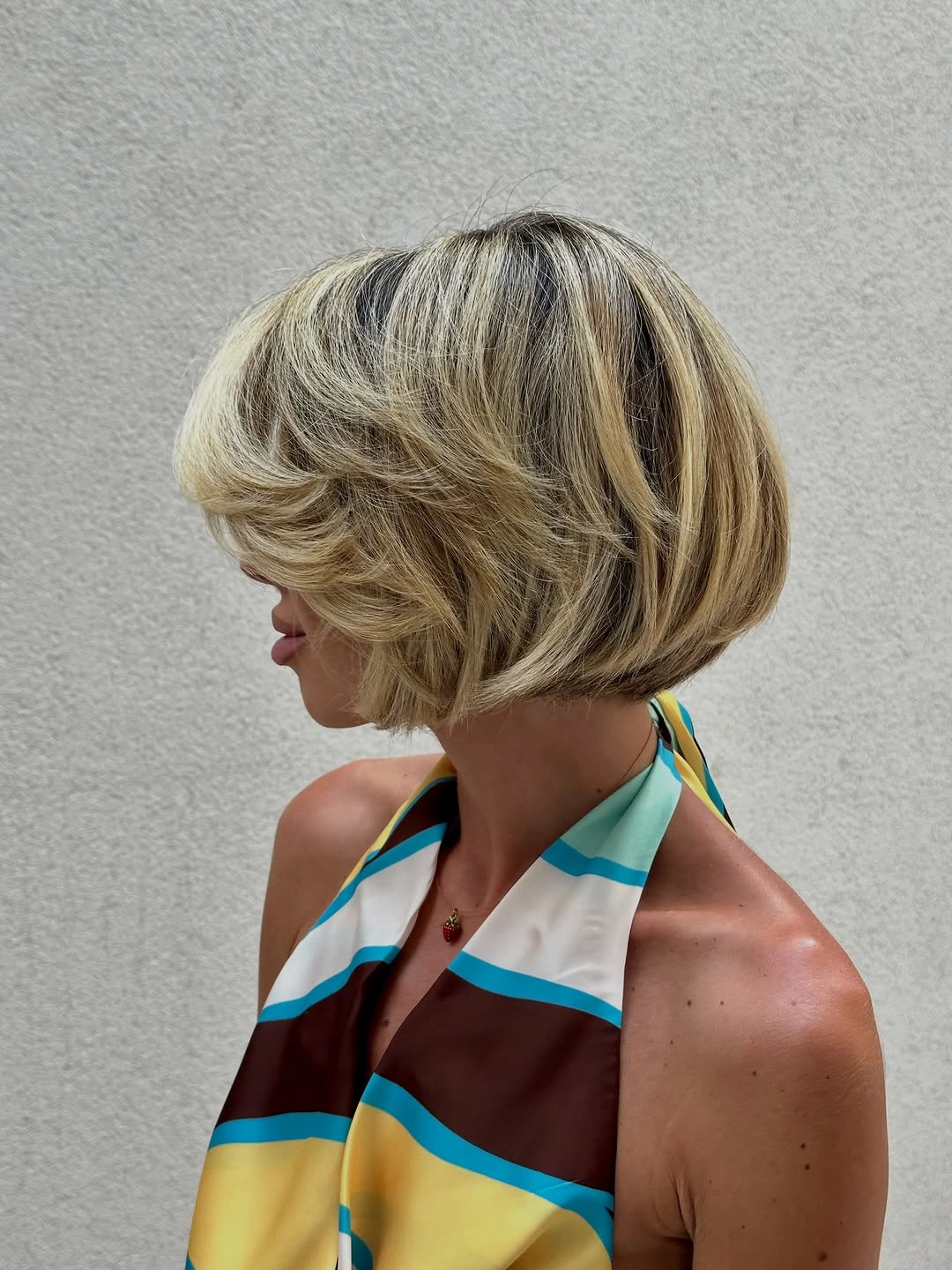 short bobbed hairstyle Rounded Blonde Bob With Full Volume