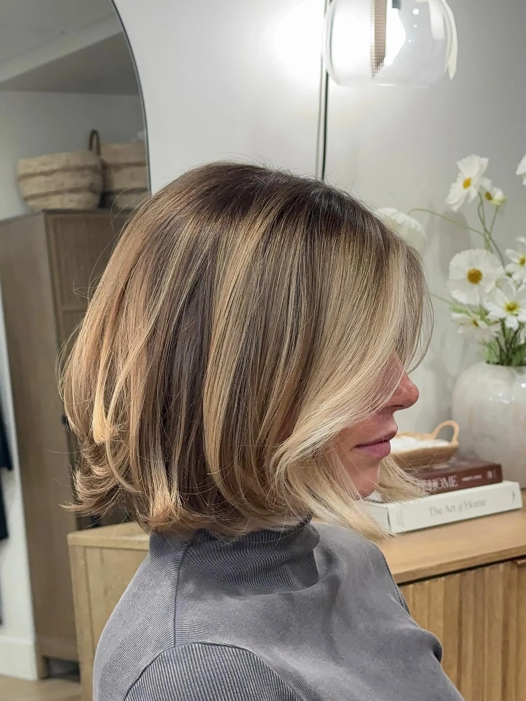 short bobbed hairstyle Layered Bob With Bright Face-Framing Blonde