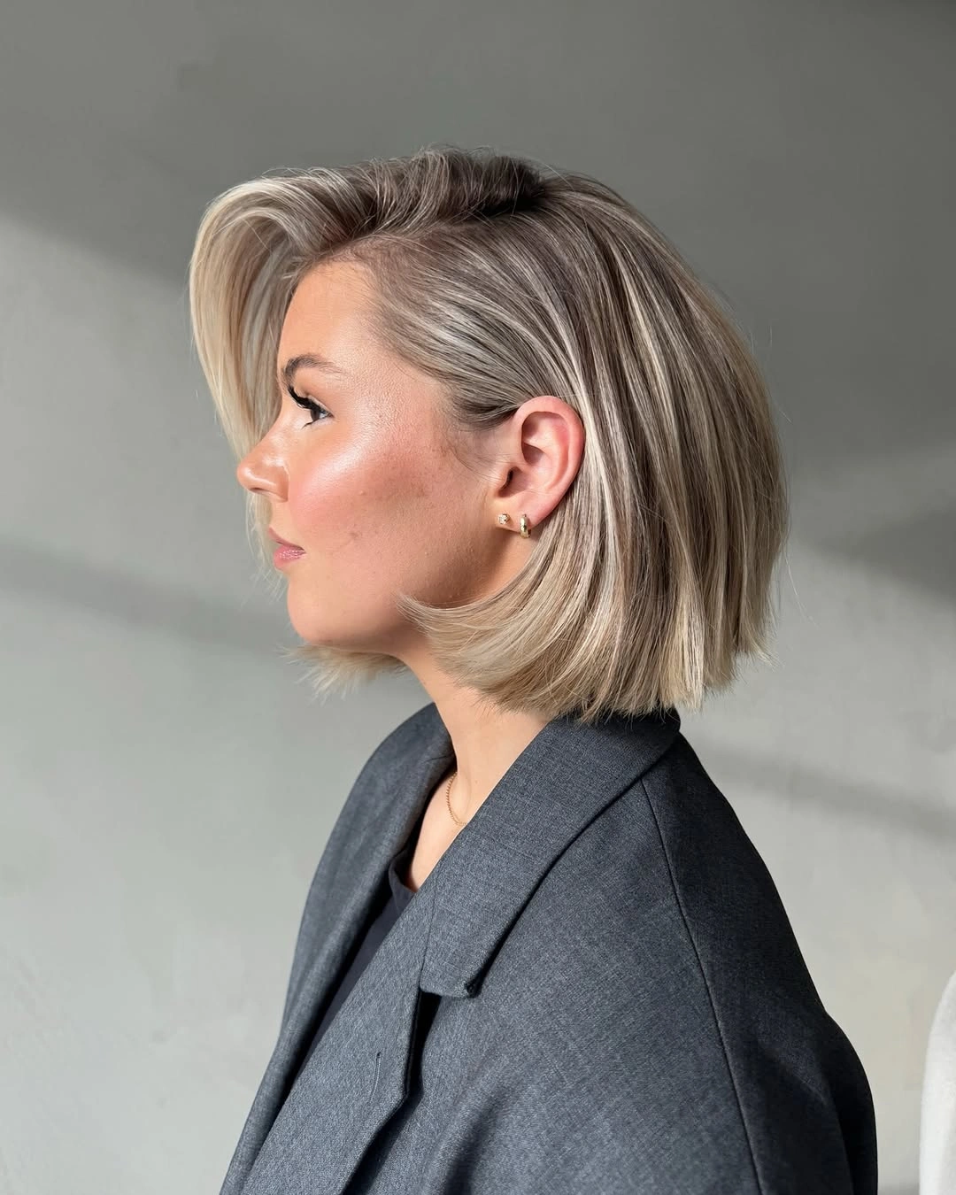 short bobbed hairstyle Voluminous Side-Swept Bob With Modern Lift