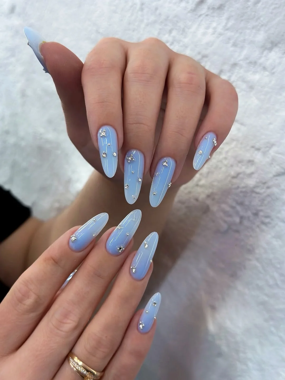 trendy nail colors for august 2026 Baby Blue Crystal Almond Nails
