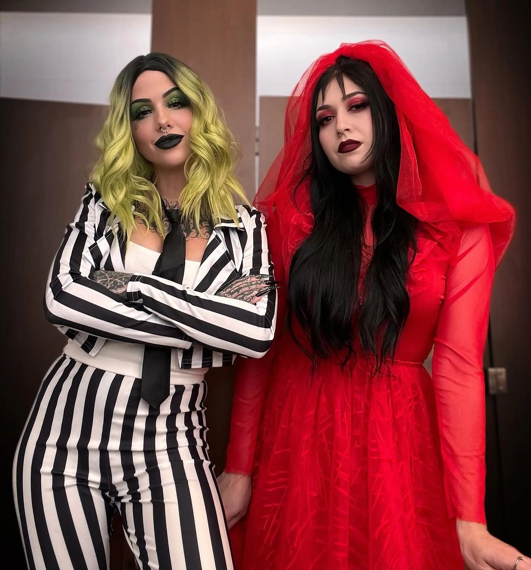 best halloween costume ideas 2026 Beetlejuice Duo With a Blood Red Twist