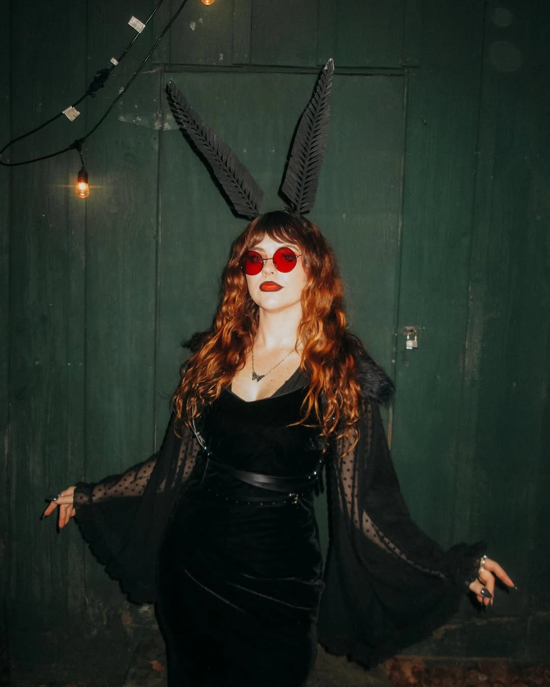 best halloween costume ideas 2026 Gothic Moth With Fiery Curly Hair