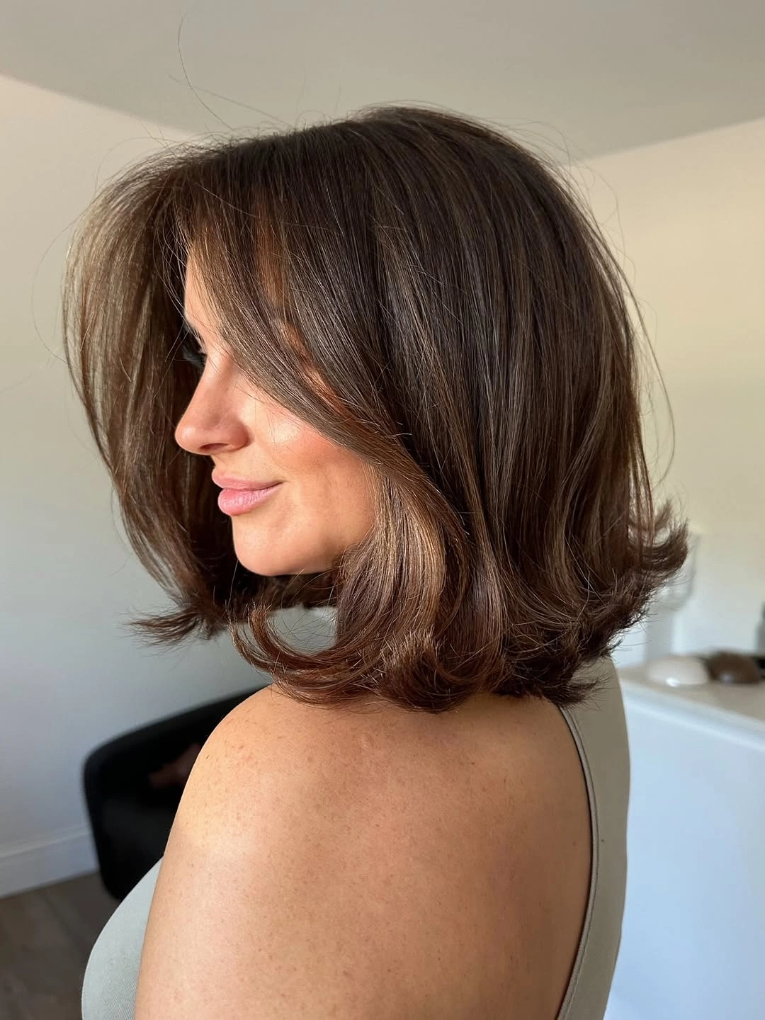 bob with layers haircut - Brown Layered Bob With a Soft Side Sweep