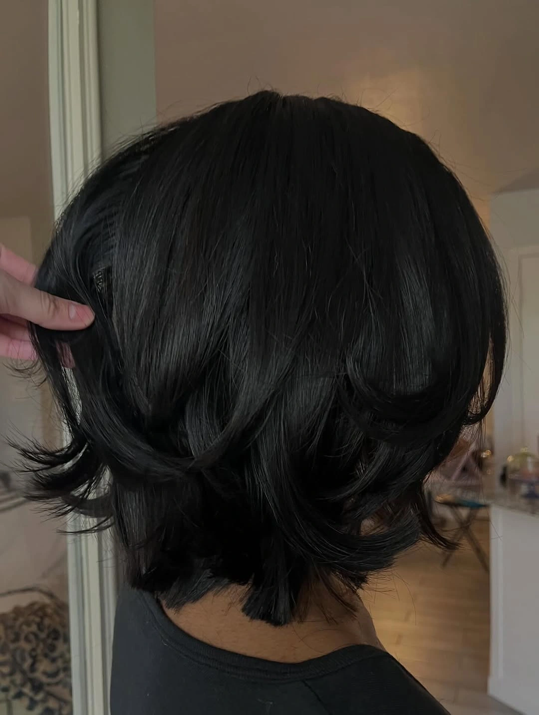 bob with layers haircut Glossy Black Bob With Flipped Ends
