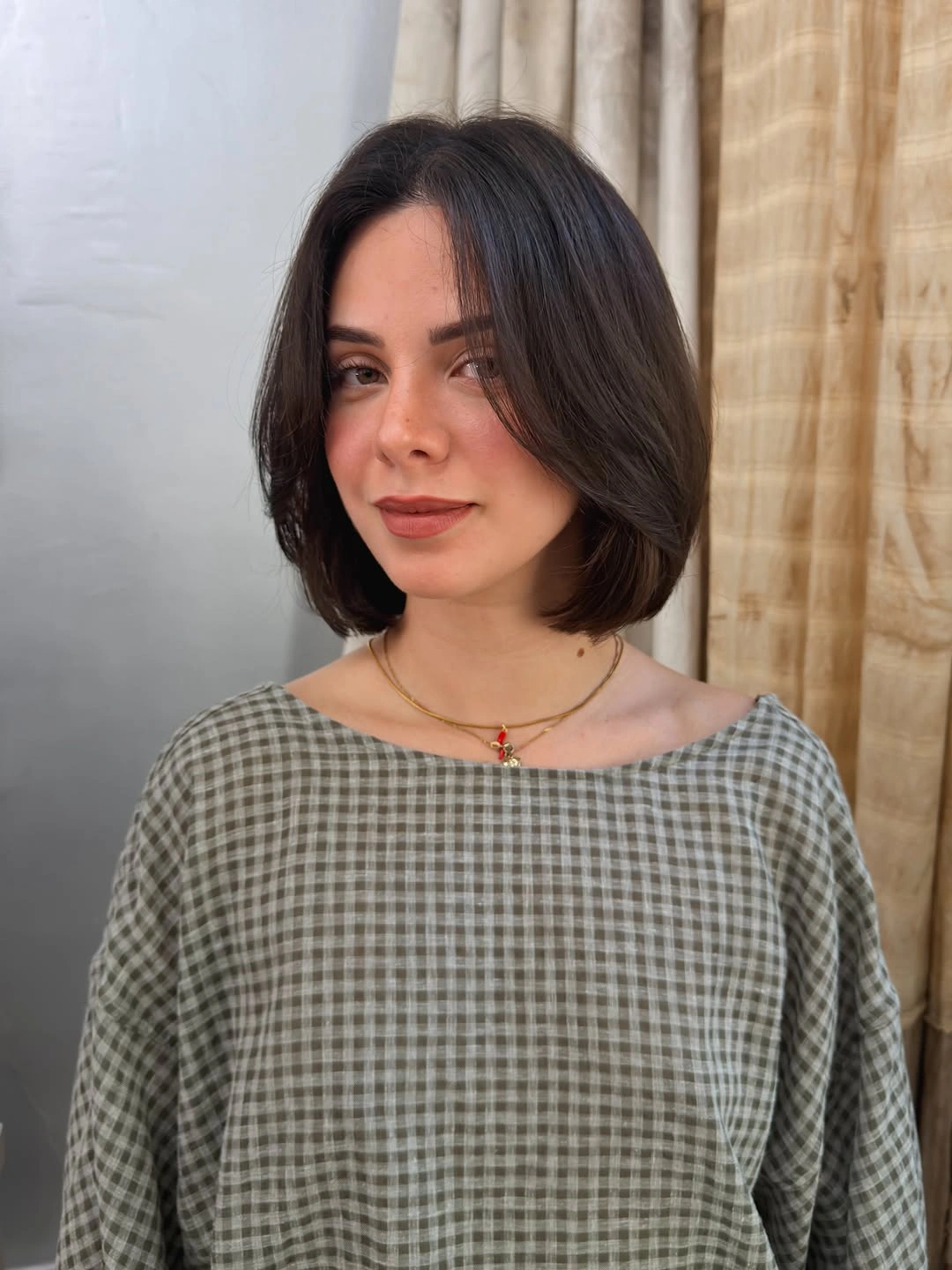 bob with layers haircut Minimal Brunette Bob With Face Framing Layers