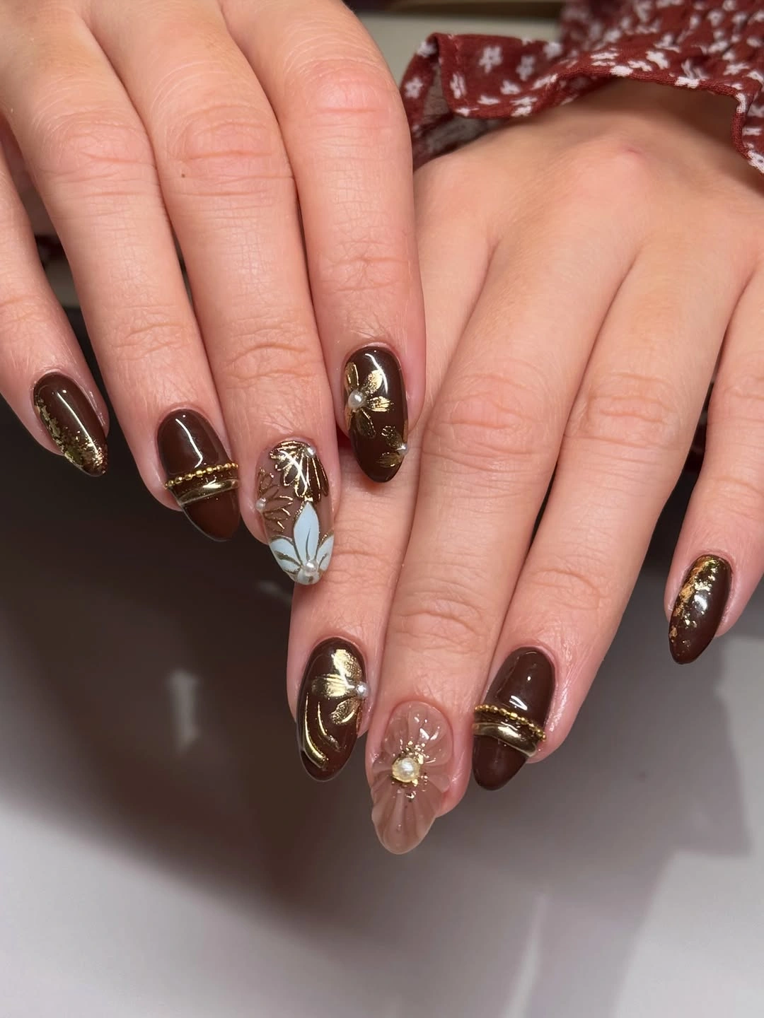 brown fall nails 2026 Chocolate Florals With Golden Details