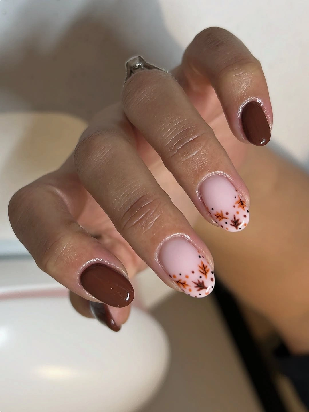 brown fall nails 2026 Simple Chocolate Nails With Delicate Autumn Leaves