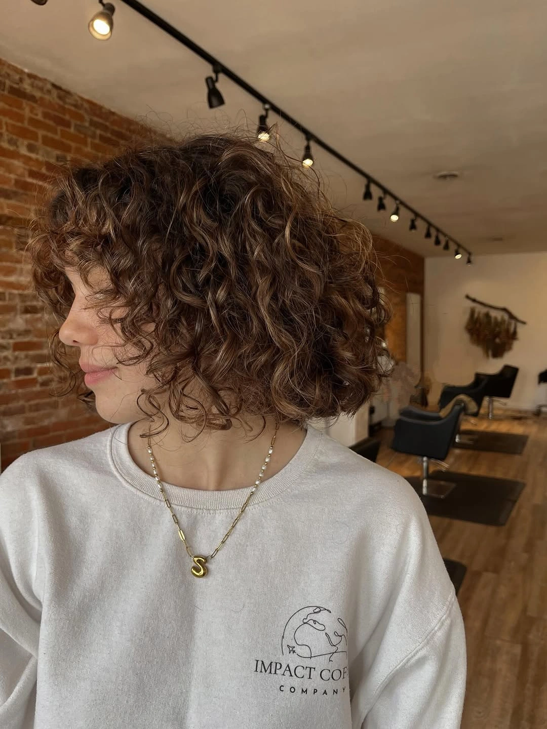 curly bob haircut Airy Brown Bob With Natural Layers