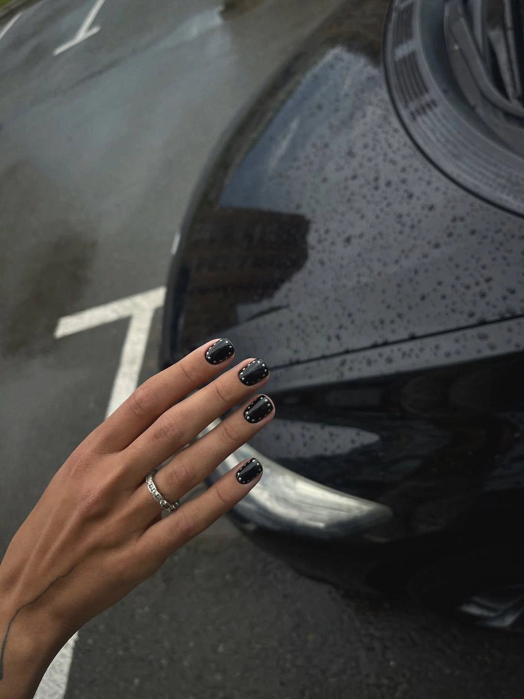 dark fall nails 2026 Black Nails With Tiny Silver Accents
