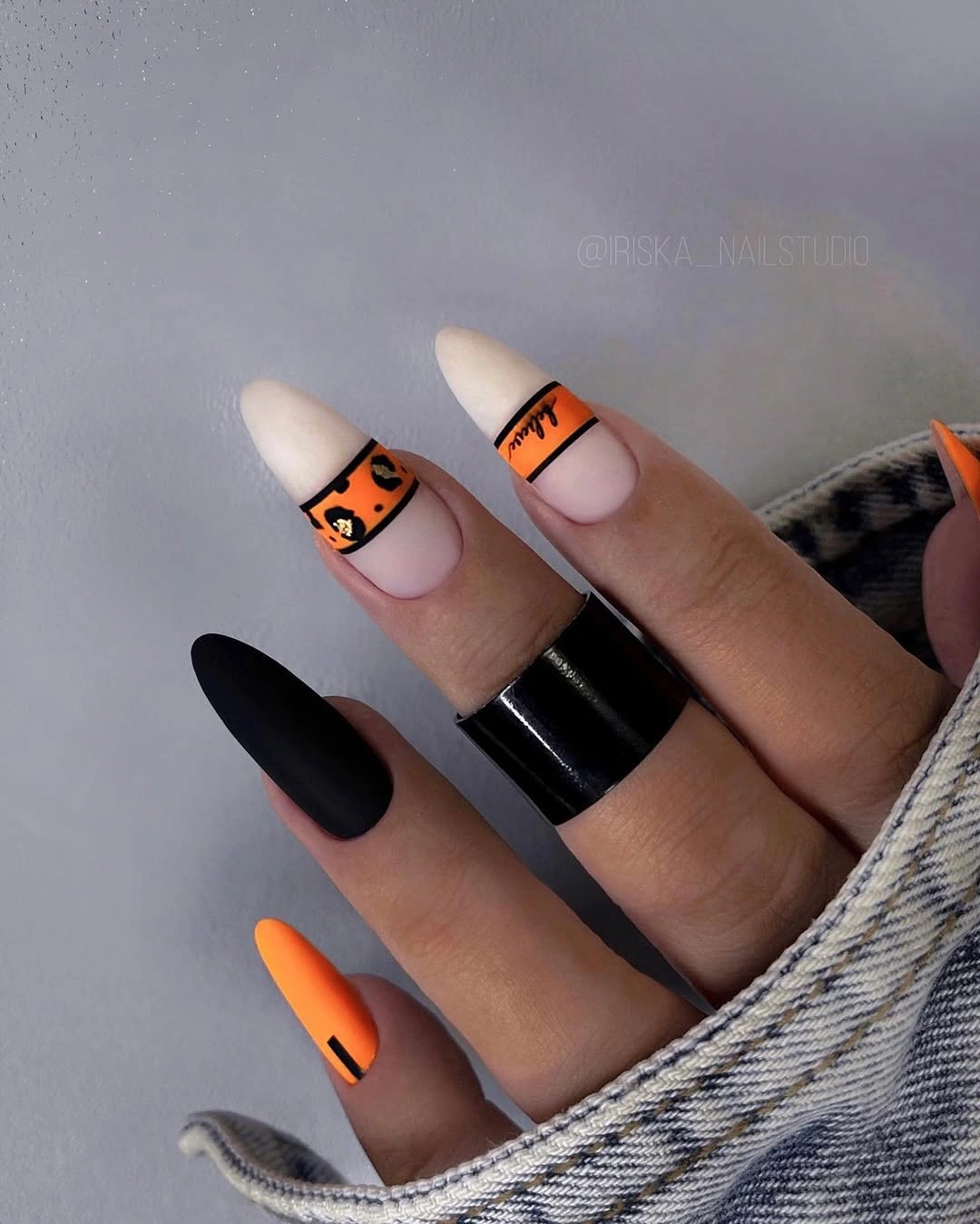 early fall nails 2026 Orange And Black Almond Statement Nails