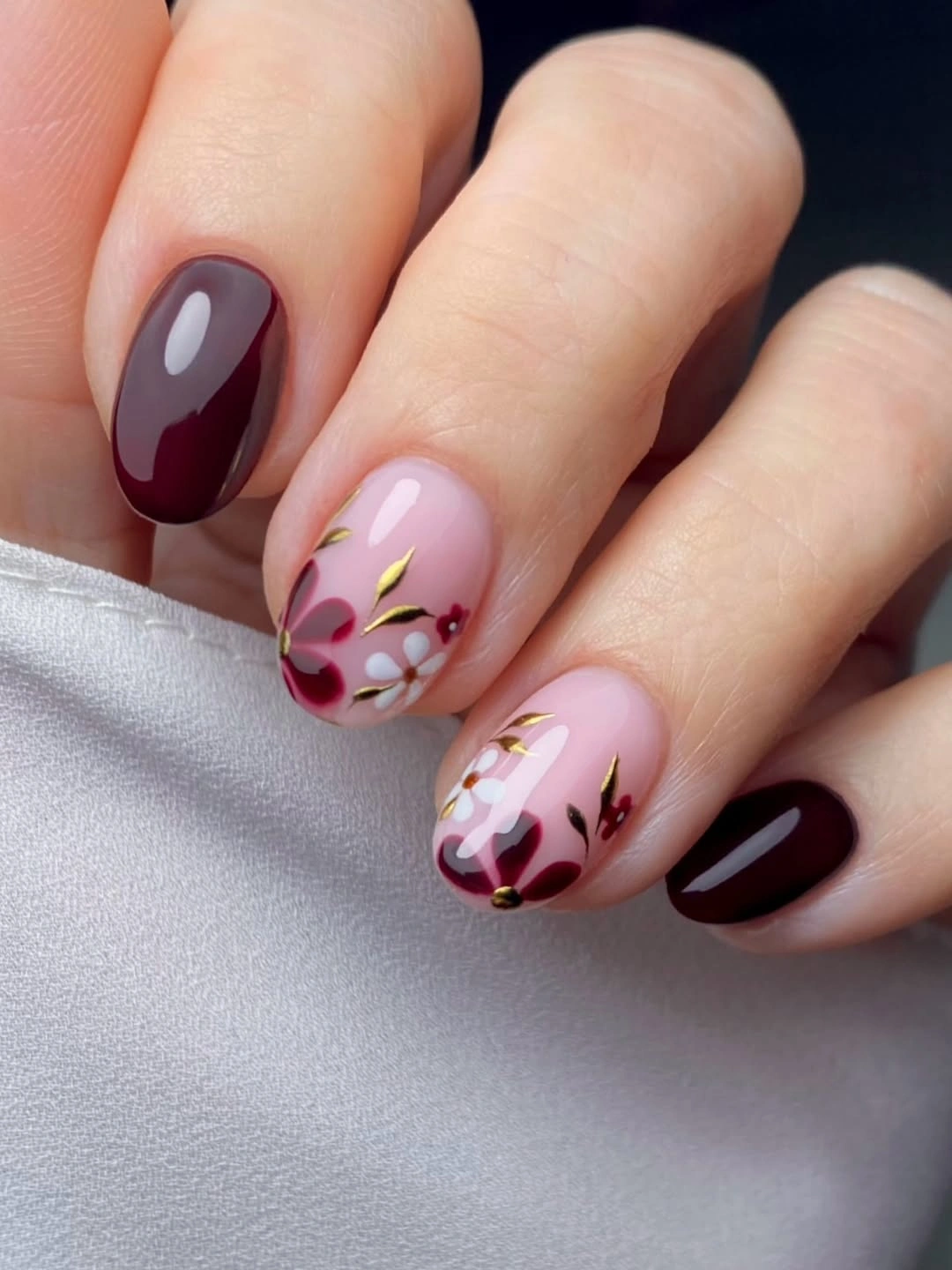 fall acrylic nails 2026 Burgundy Floral Acrylic Nails With Delicate Gold Details