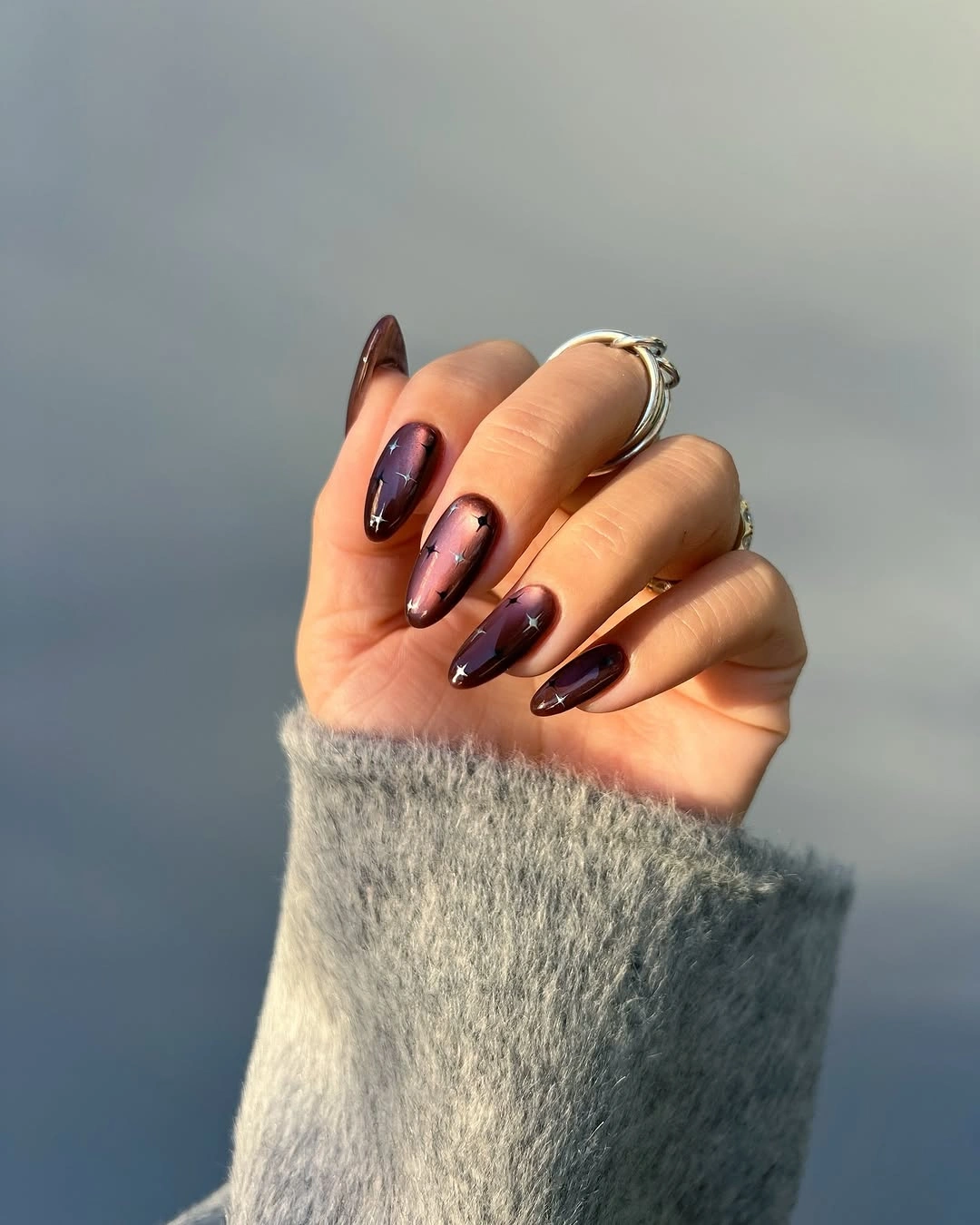 fall burgundy nails with design Dark Burgundy Almond Nails With Tiny Star Details