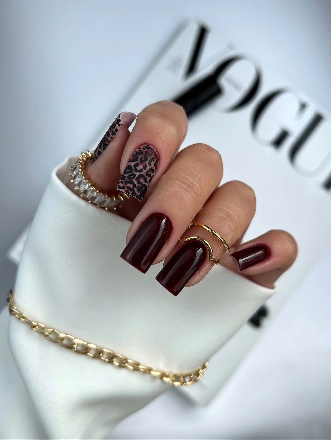 fall burgundy nails with design Deep Burgundy With Leopard Accent