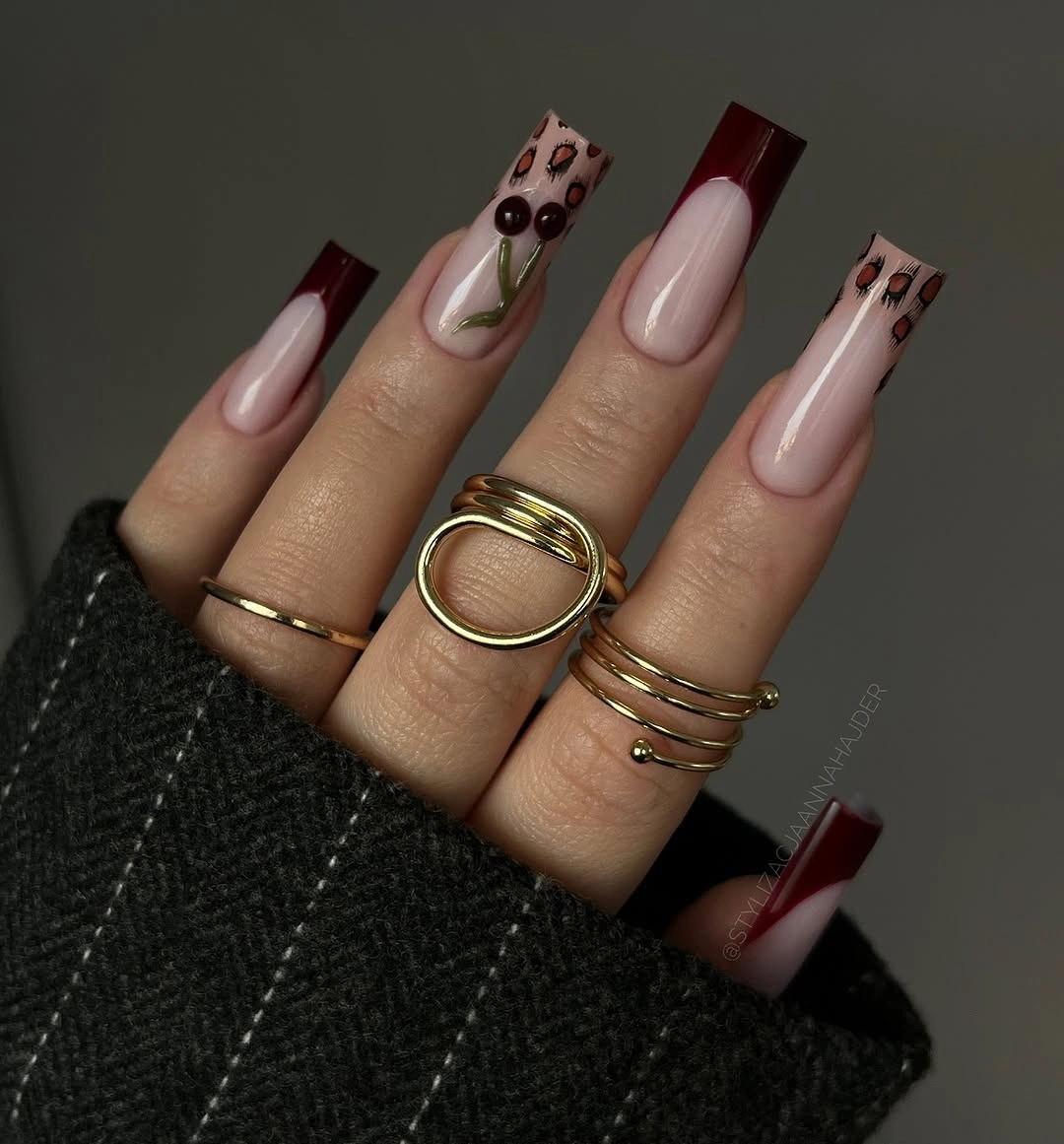fall burgundy nails with design Burgundy French Tips With Tiny Floral Accents