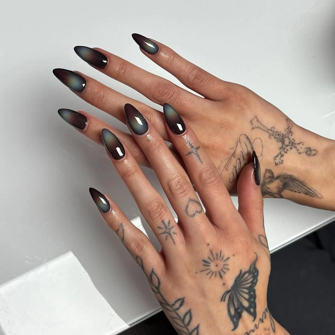 fall dark nail shadow ideas 2026 Smoky Black Cat Eye Almond Nails