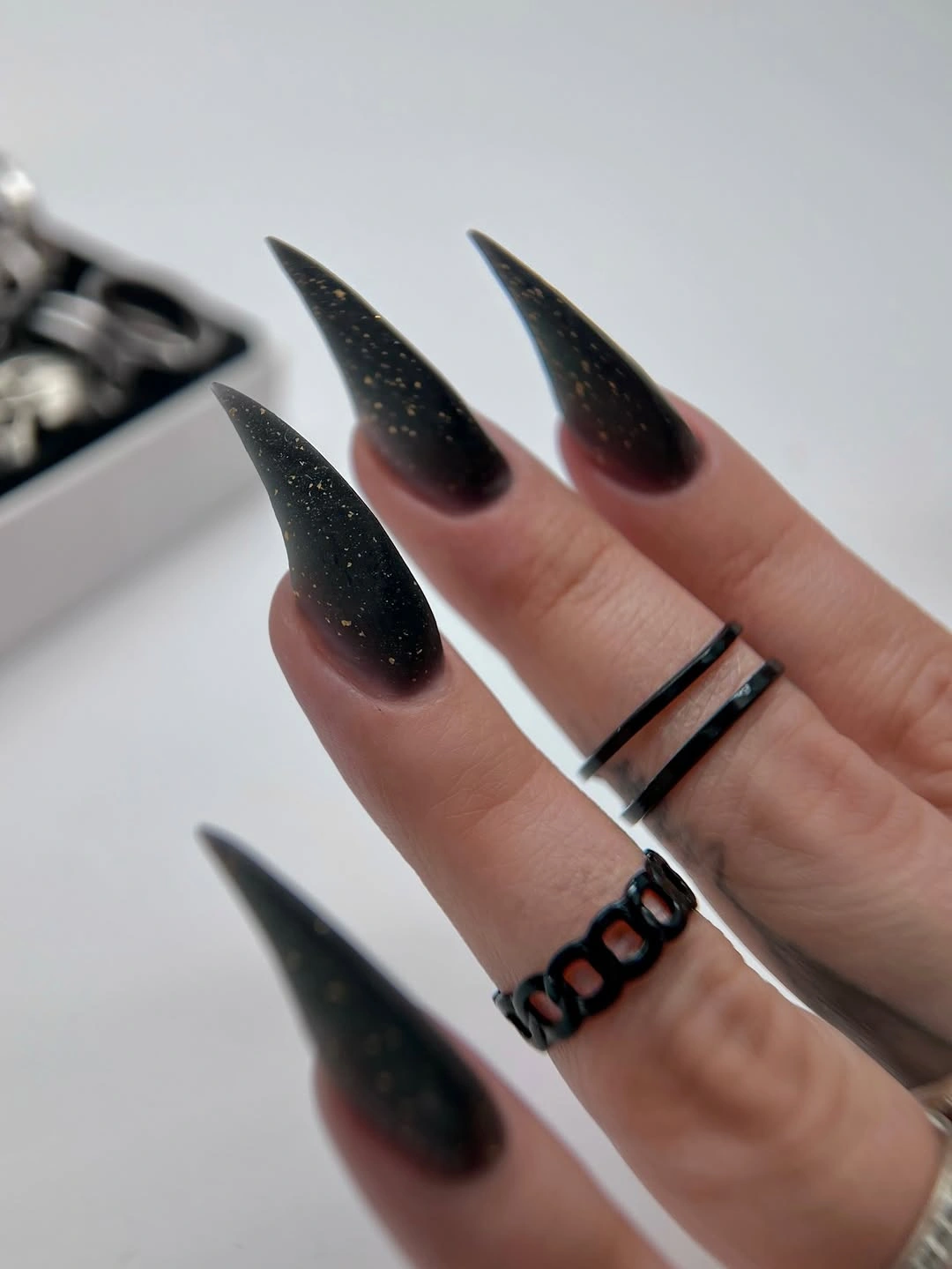 fall dip nails 2026 Midnight Black Gold Stiletto Nails