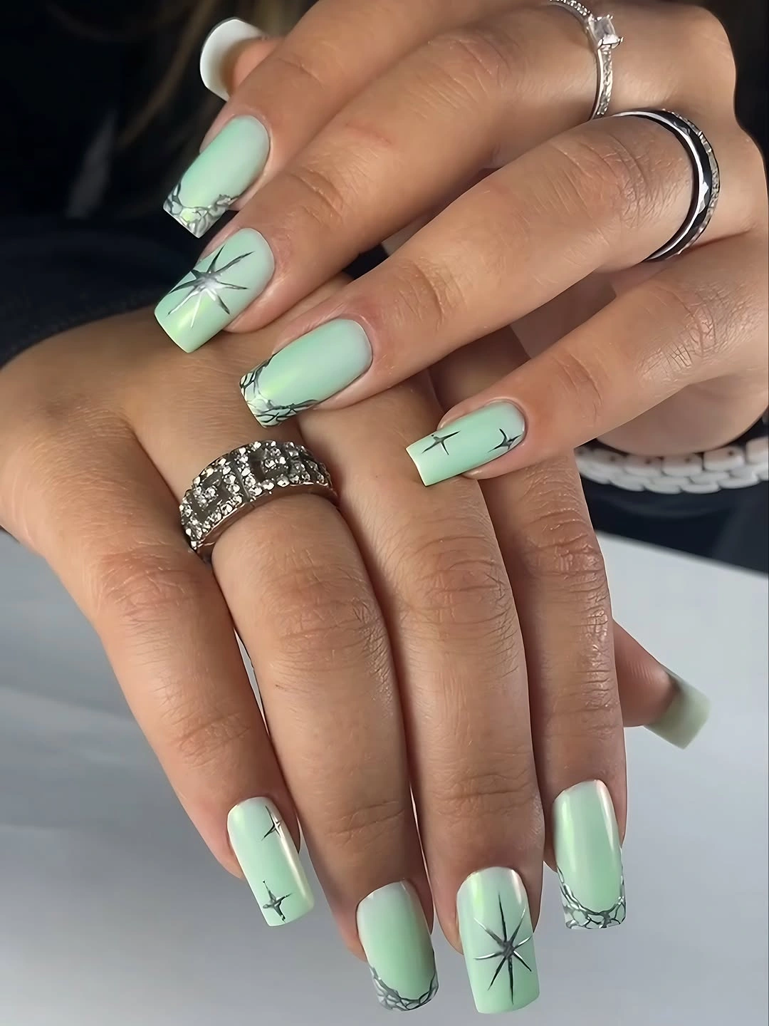 fall gel nails ideas 2026 Mint Green Starburst Nails