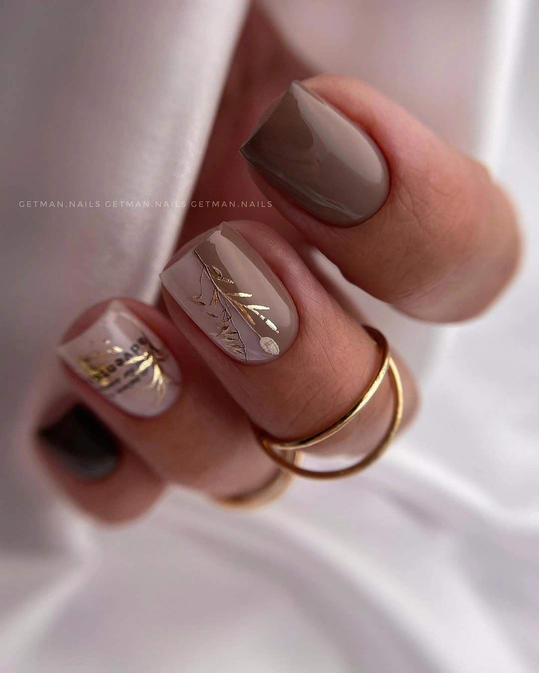 Fall gel nails ideas 2026 Soft Taupe Leaf Nails