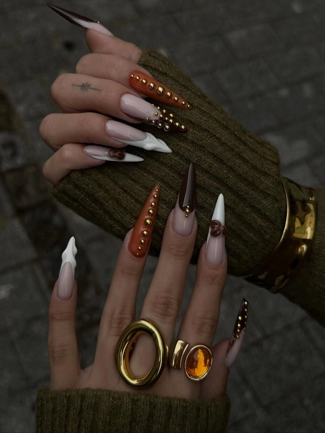 fall long nails 2026 Brown And Gold Studded Autumn Nails