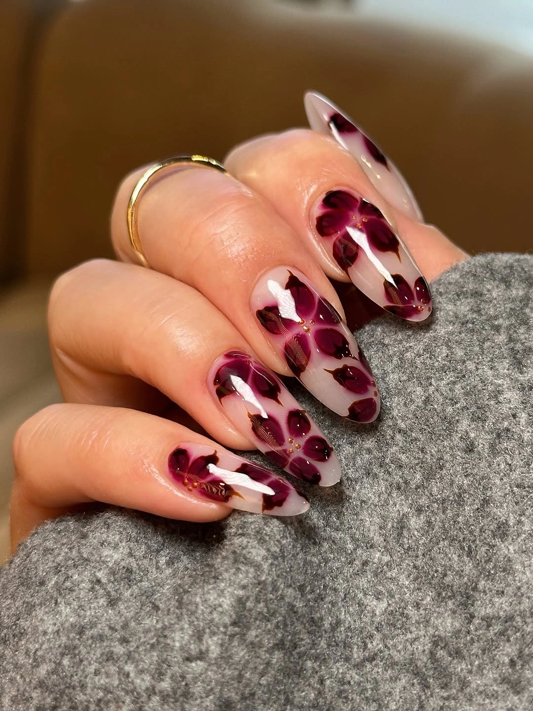 fall manicure ideas 2026 Moody Burgundy Floral Almond Nails