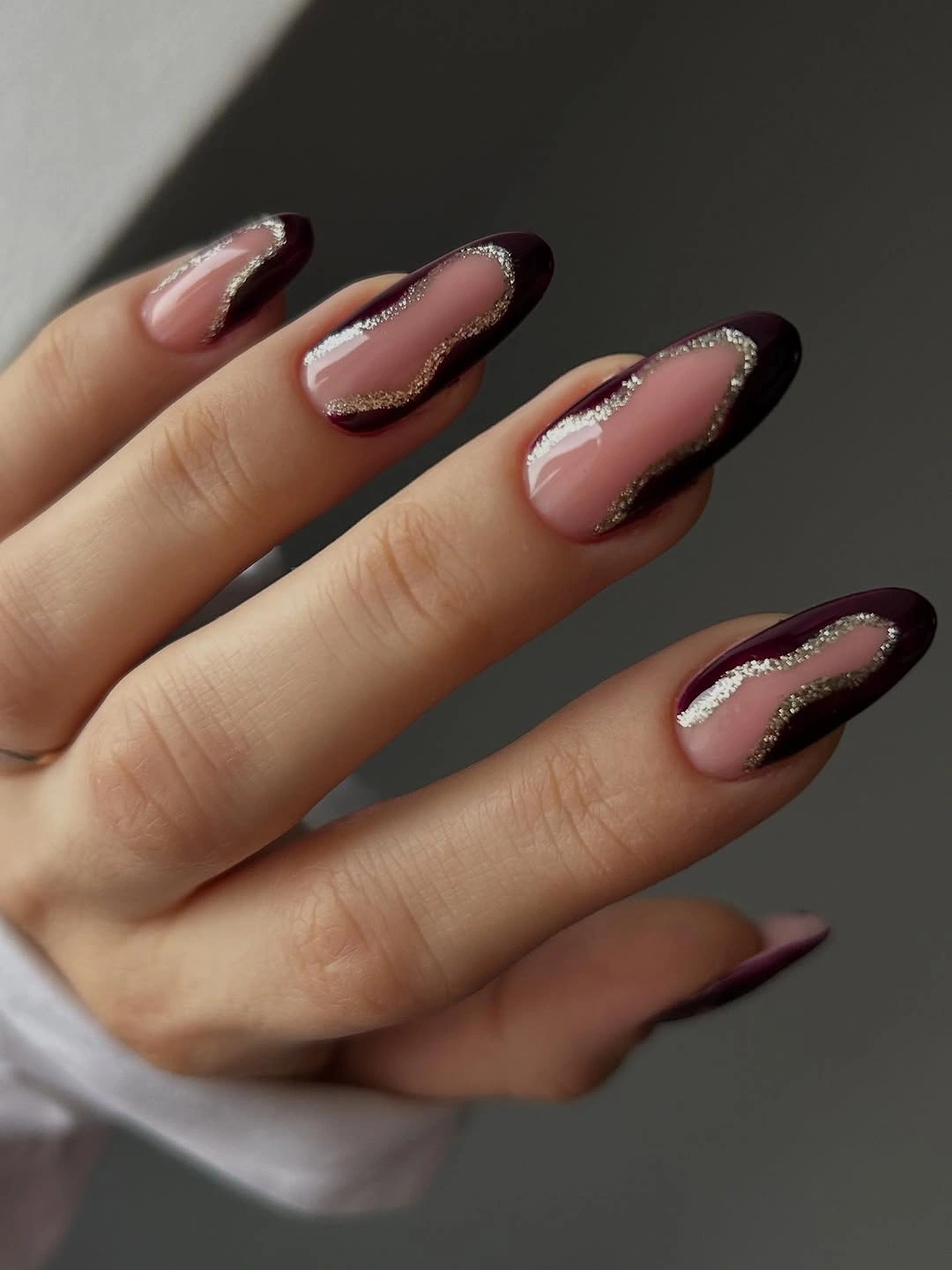 fall manicure ideas 2026 Deep Burgundy Waves With Shimmer