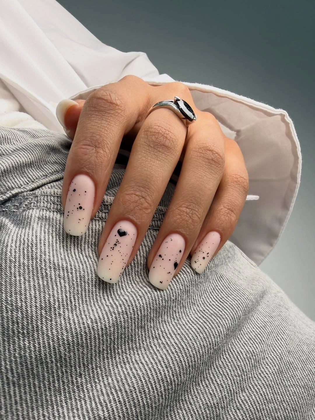 fall matte nails 2026 Milky Matte Nails With Black Speckles