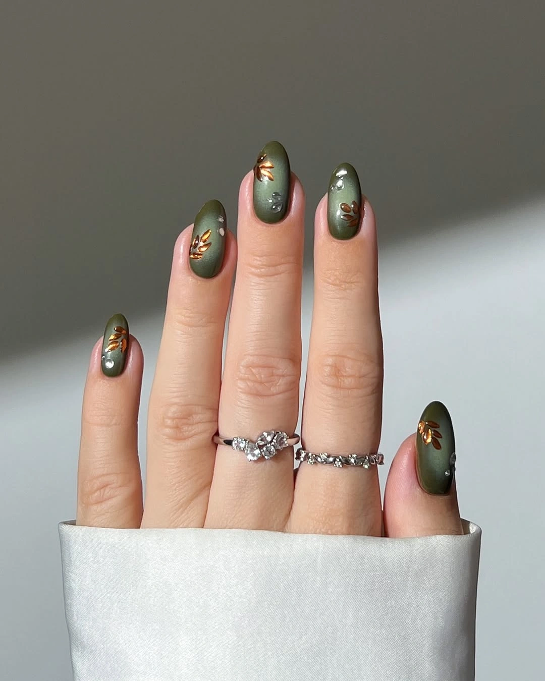 fall nail art ideas 2026 Olive Green Nails With Copper Leaves
