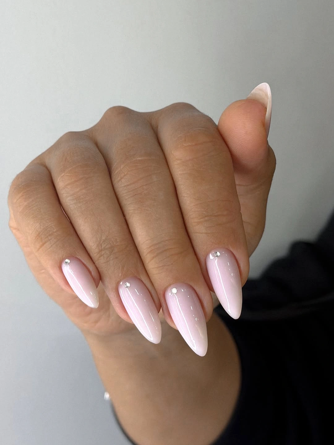 fall nail designs for office 2026 Milky Almond Nails With Delicate Crystal Details