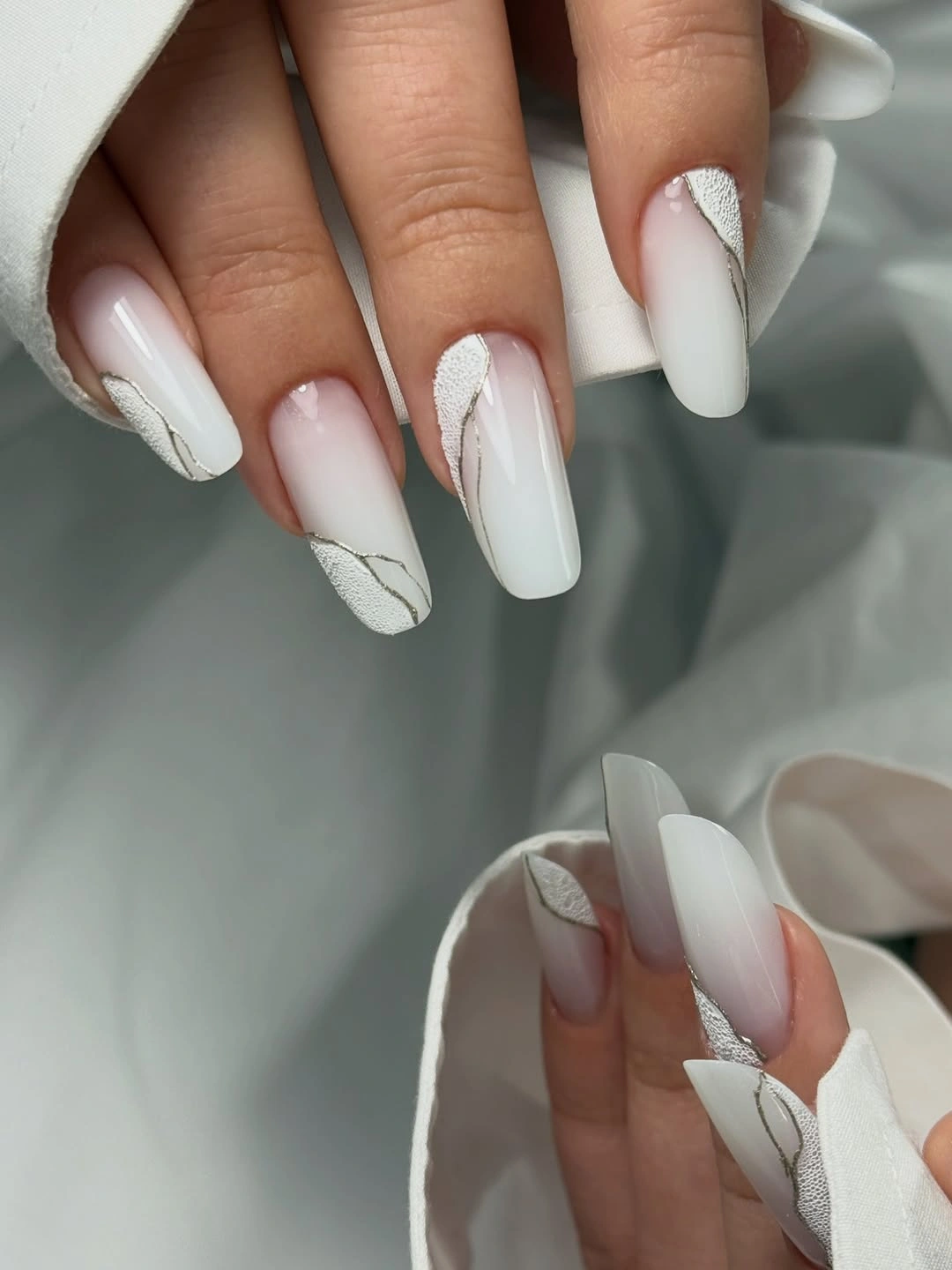 fall nail designs for office 2026 Soft White Ombre With Modern Silver Waves