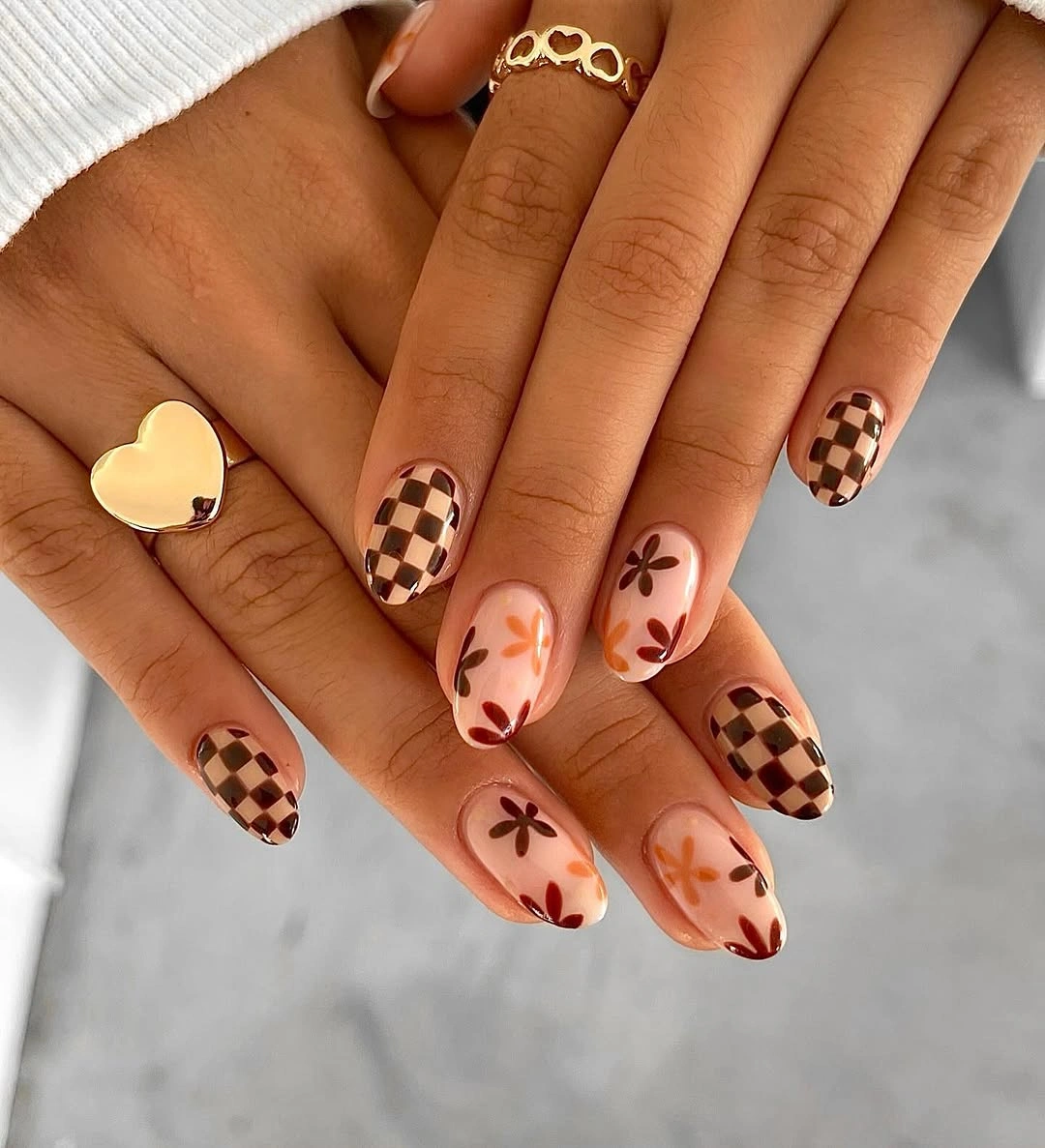 fall nail trends 2026 Chocolate Checkerboard With Soft Floral Details