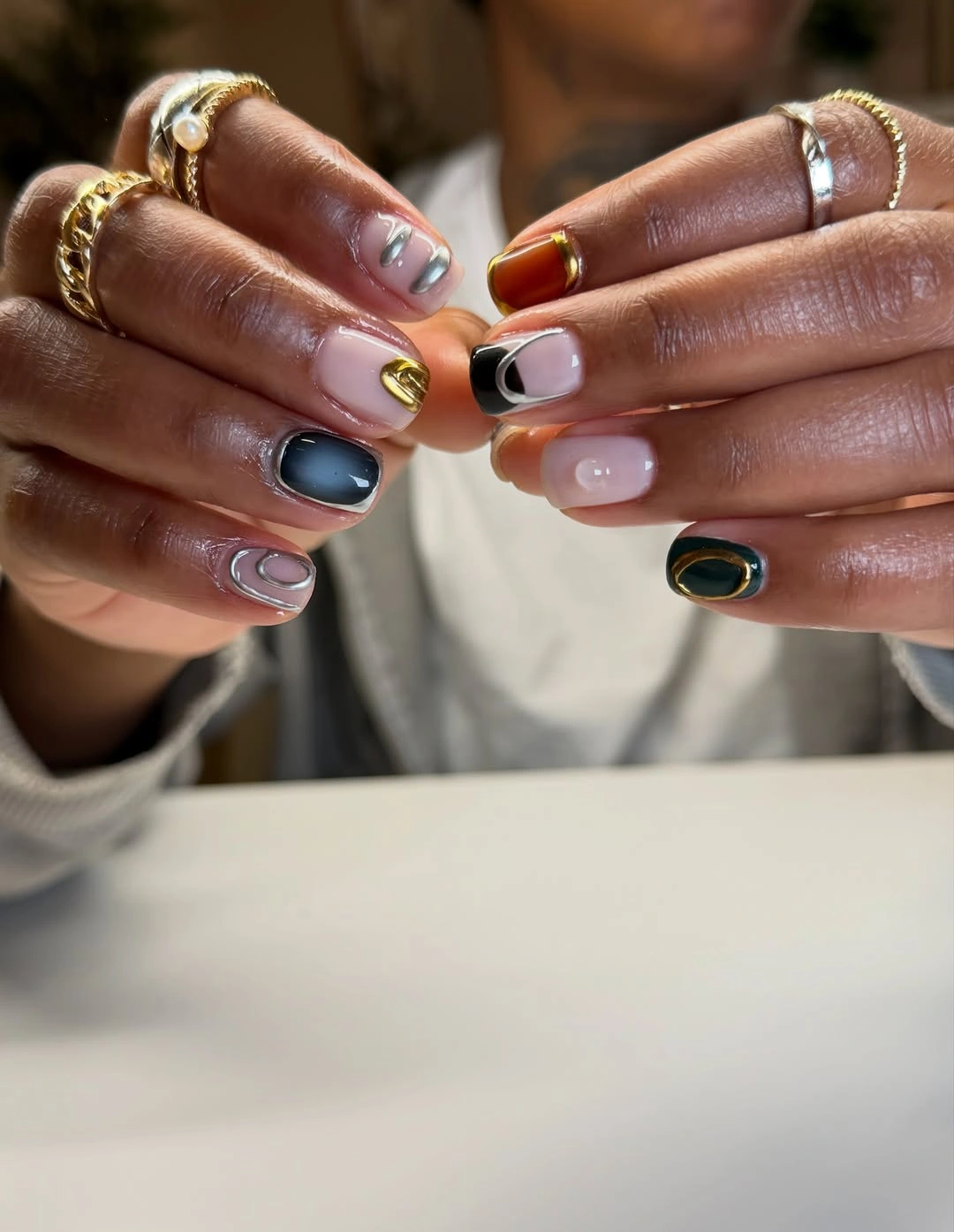 fall nails for brown skin tone Minimalist Mixed Metals On A Soft Nude Base