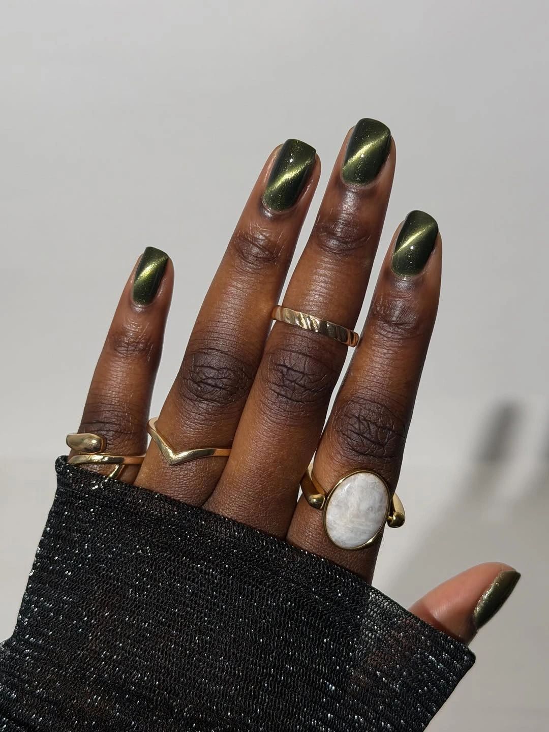 fall nails for dark skin 2026 Olive Cat Eye Nails With Autumn Depth