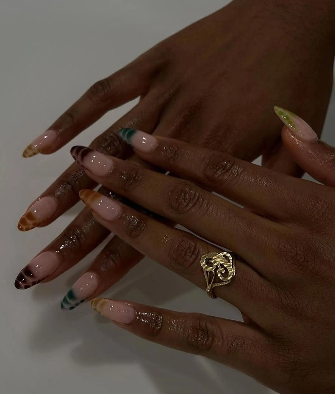 fall nails for dark skin 2026 Colorful Marble Tips With An Artistic Twist