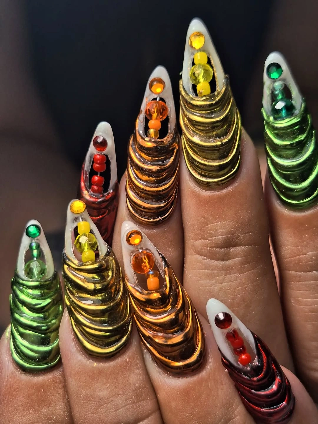 fall nails for medium skin tone Sculptural Metallic Stiletto Nails