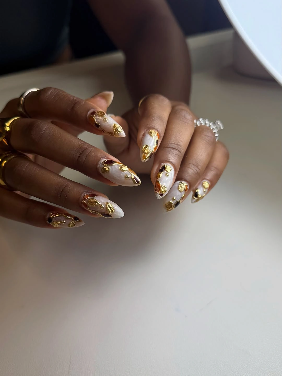 Fall nails for tan skin tone gold foil pearl nail art