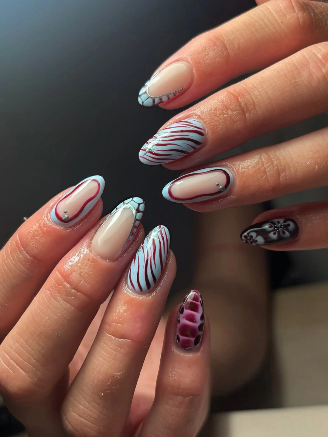 fall nails with accent nail Burgundy Waves With Icy Blue Accents