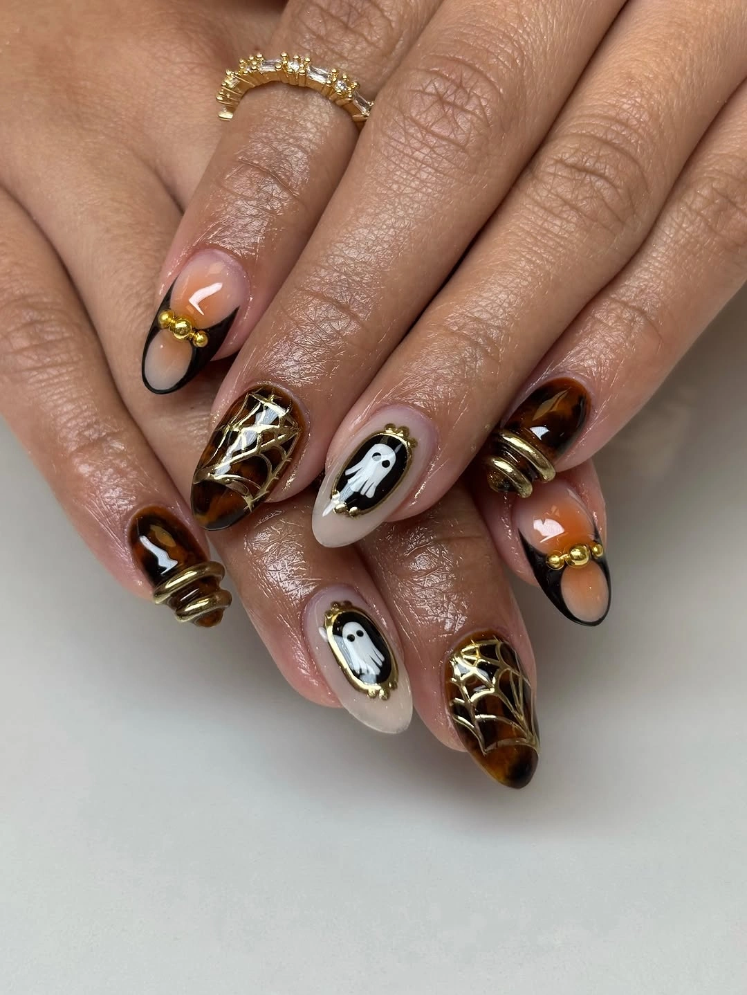fall nails with autumn designs Tortoiseshell Ghost Almond Nails