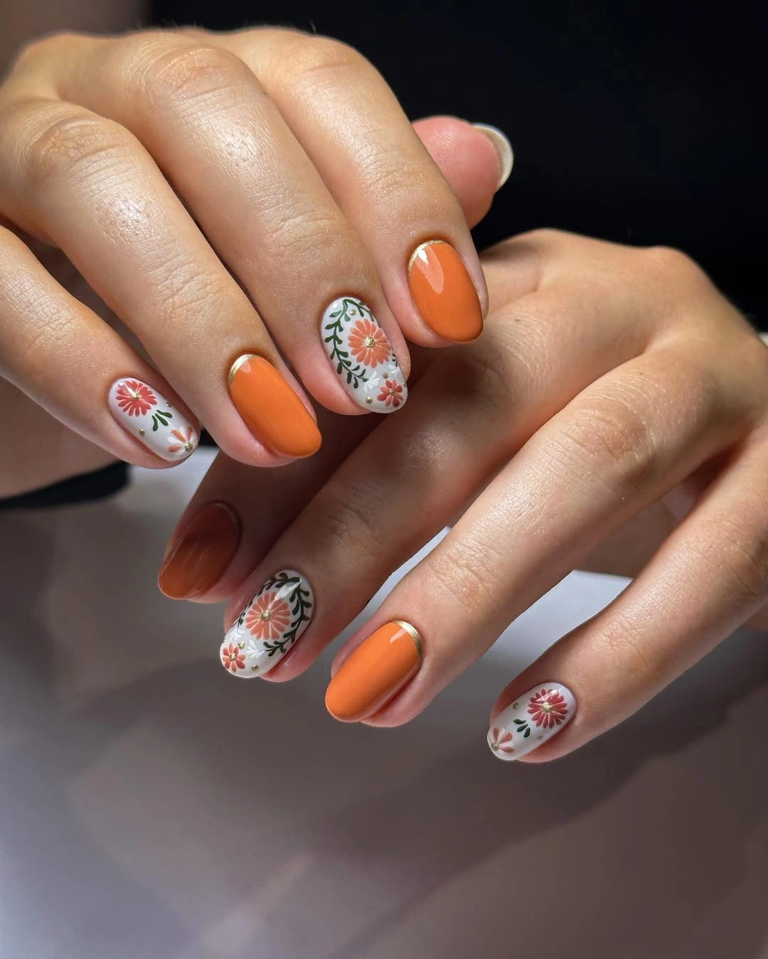 fall short almond nails 2026 Soft Floral Nails In Warm Pumpkin Tones