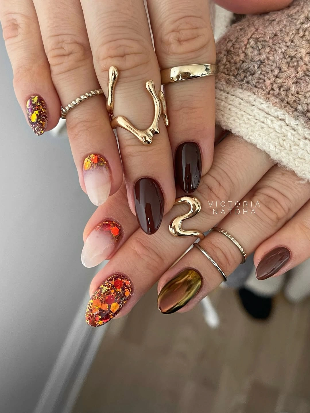 fall short almond nails 2026 Chocolate Chrome And Glitter Mix