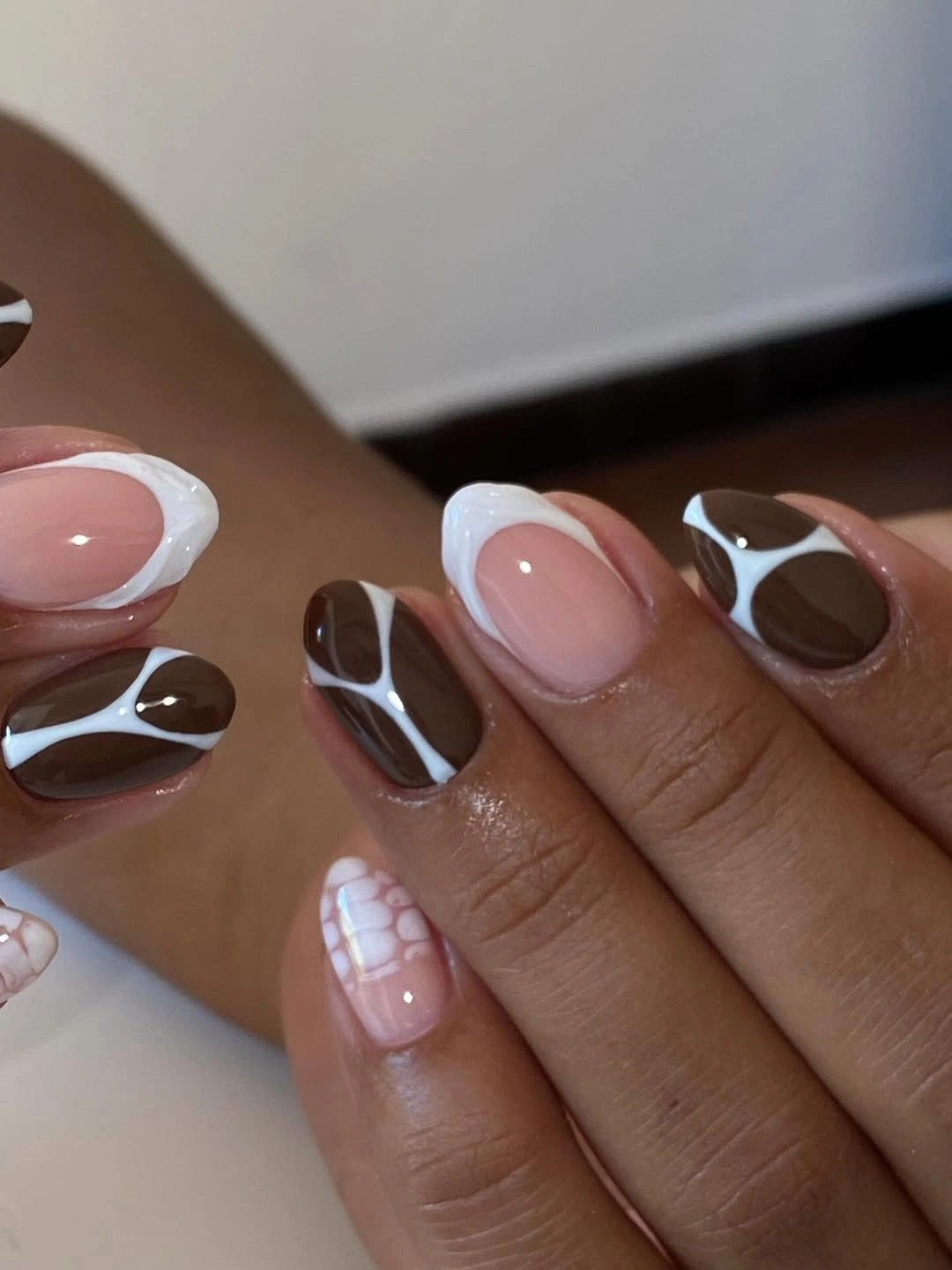 fall short almond nails 2026 Modern Chocolate Abstract French