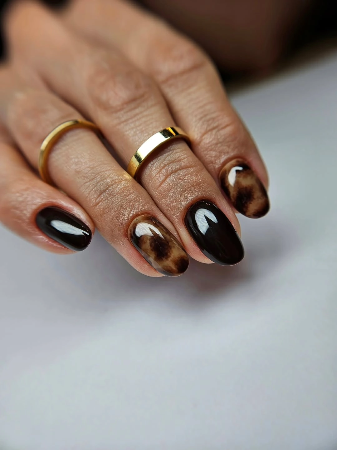 fall short almond nails 2026 Moody Tortoiseshell Nails With Glossy Black