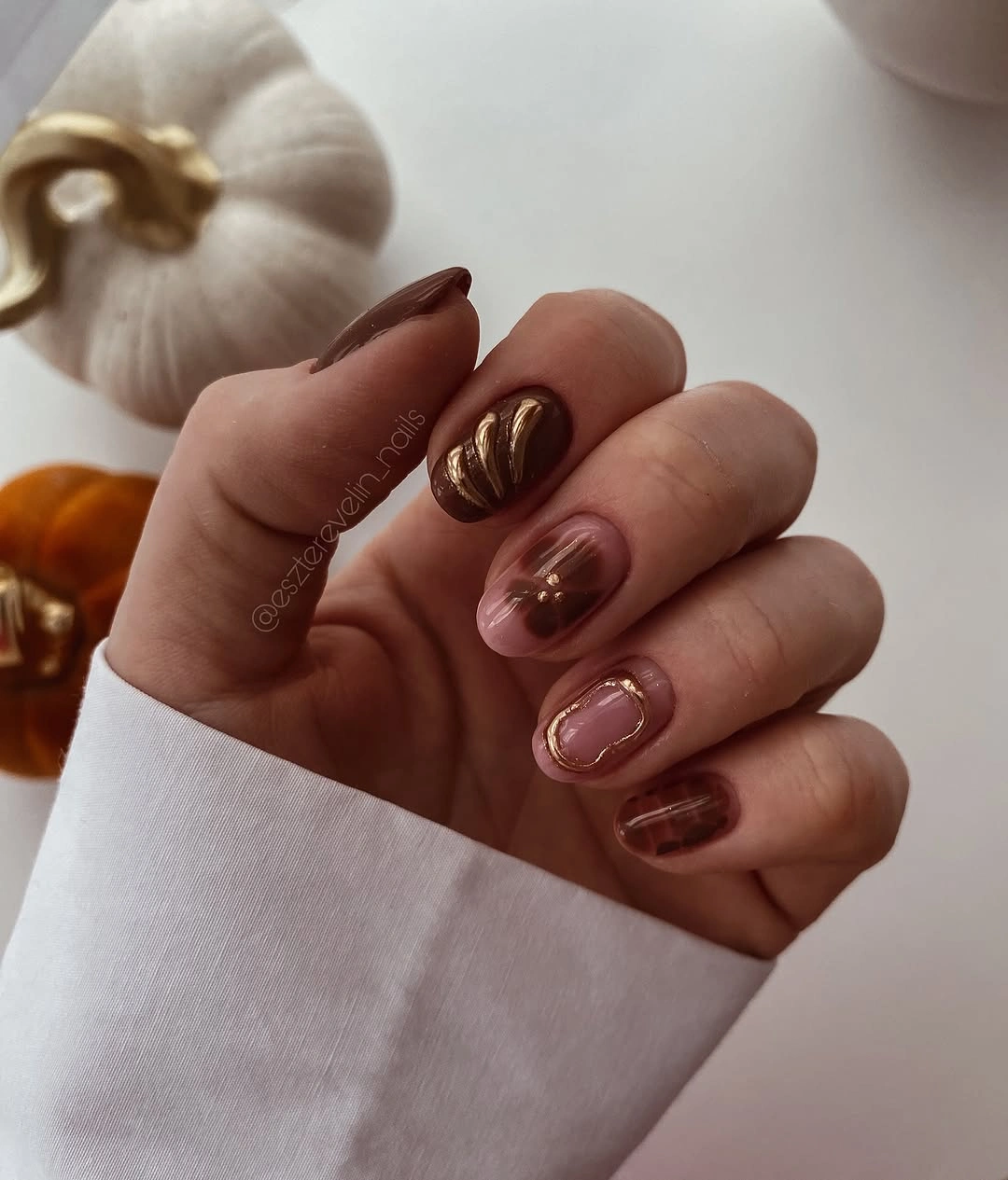 fall short almond nails 2026 Soft Brown Details With Elegant Gold Accents