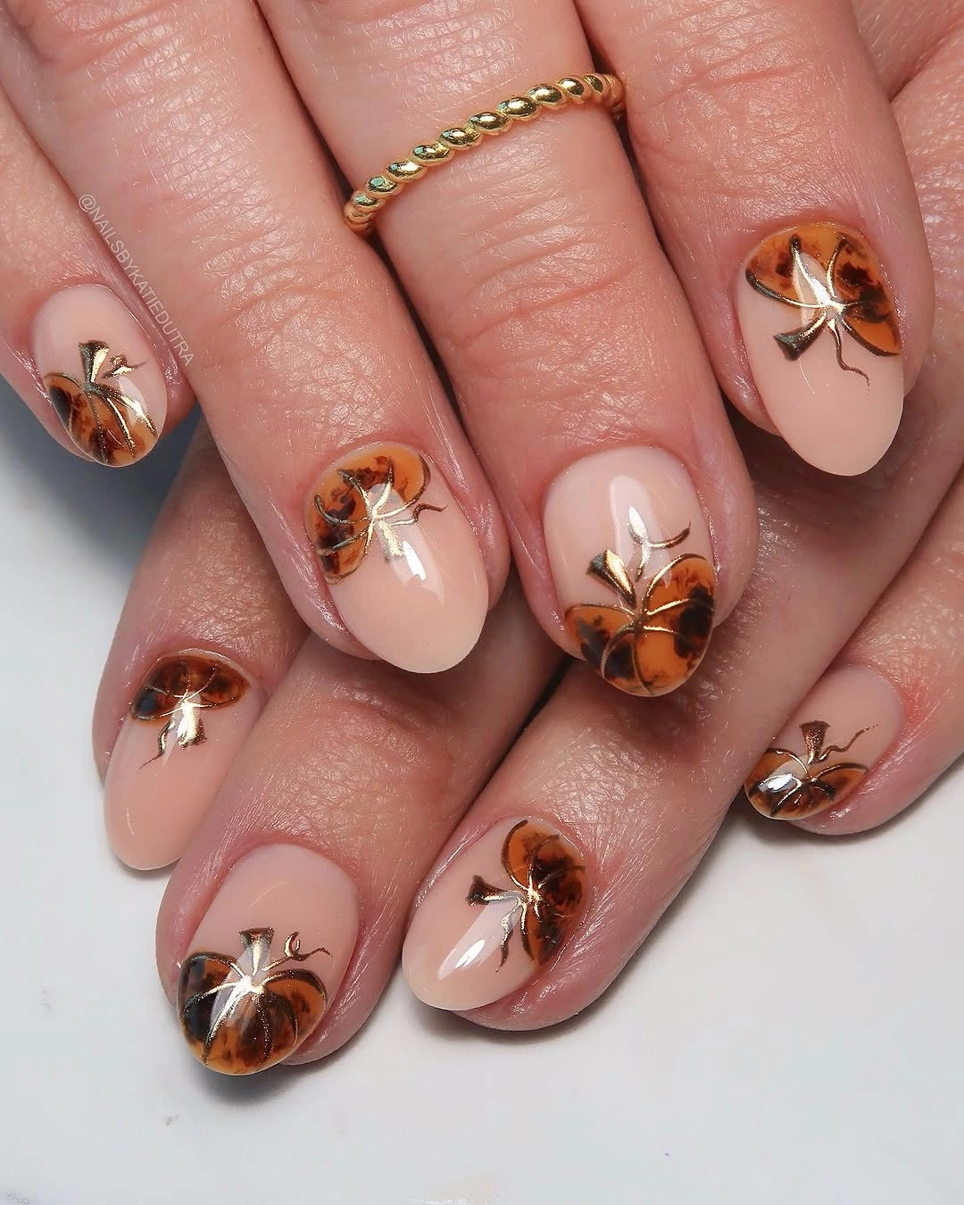 fall short almond nails 2026 Elegant Nude Nails With Tortoiseshell Pumpkins