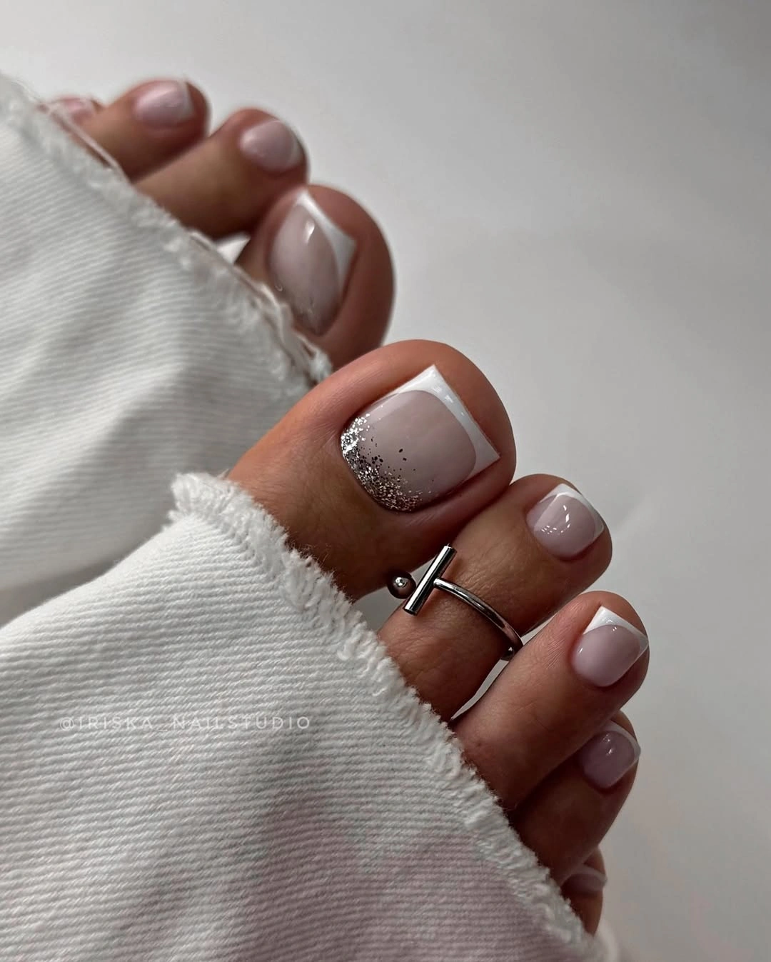 fall toe nails colors 2026 Milky White French Tip Pedicure