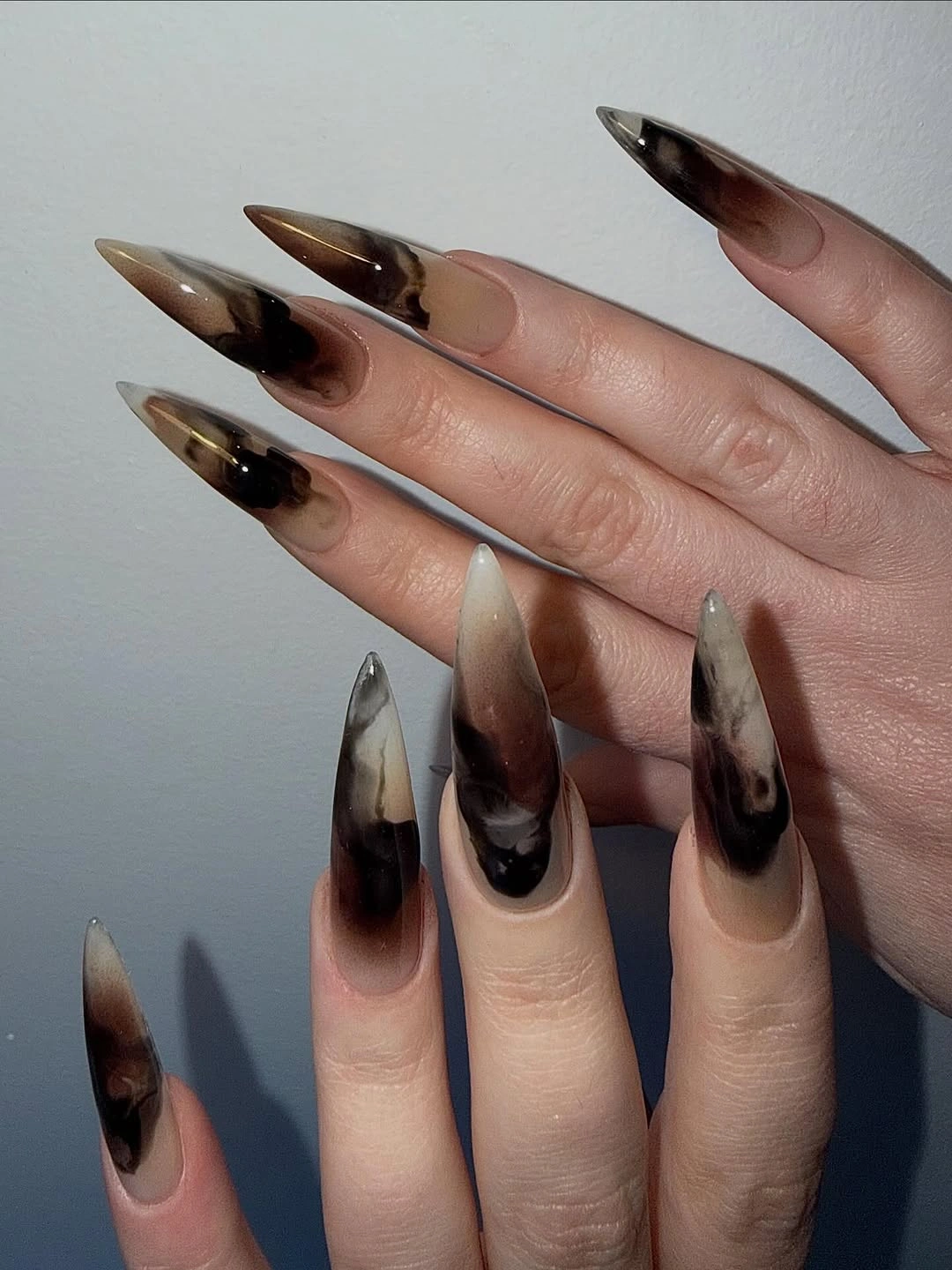 fall trendy nails 2026 Smoky Brown Stiletto Nails