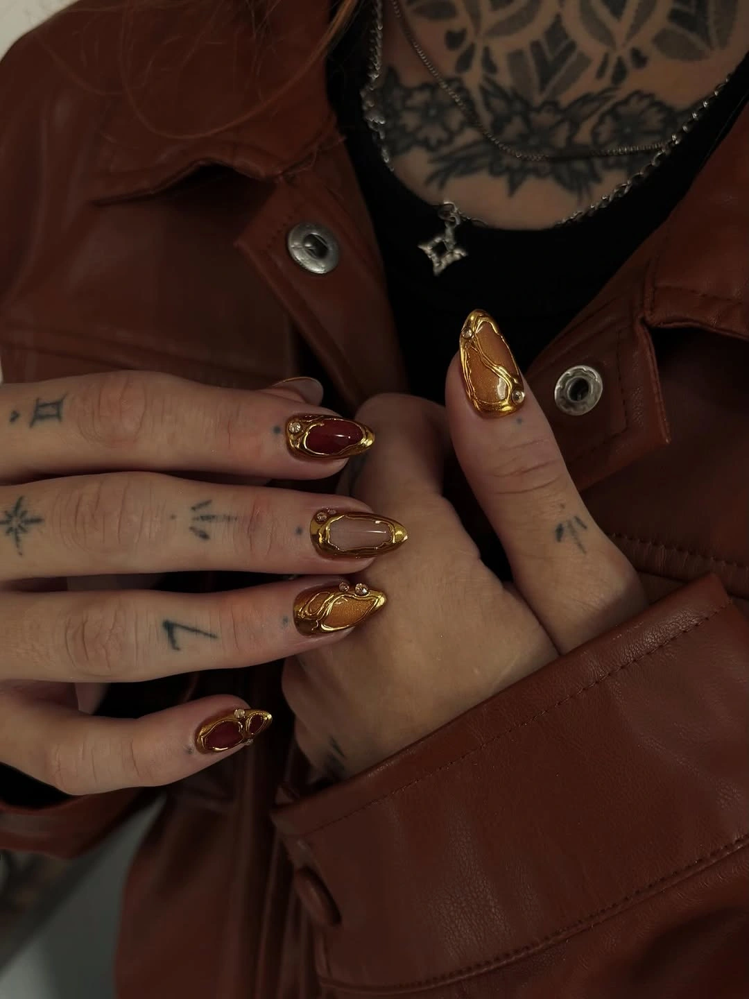 fall trendy nails 2026 Molten Gold And Burgundy Nails