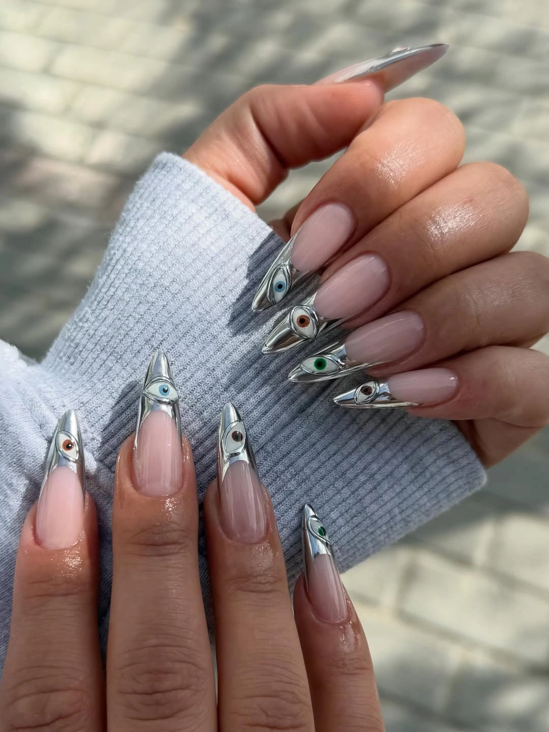 fall trendy nails 2026 Chrome Eye Accent Almond Nails